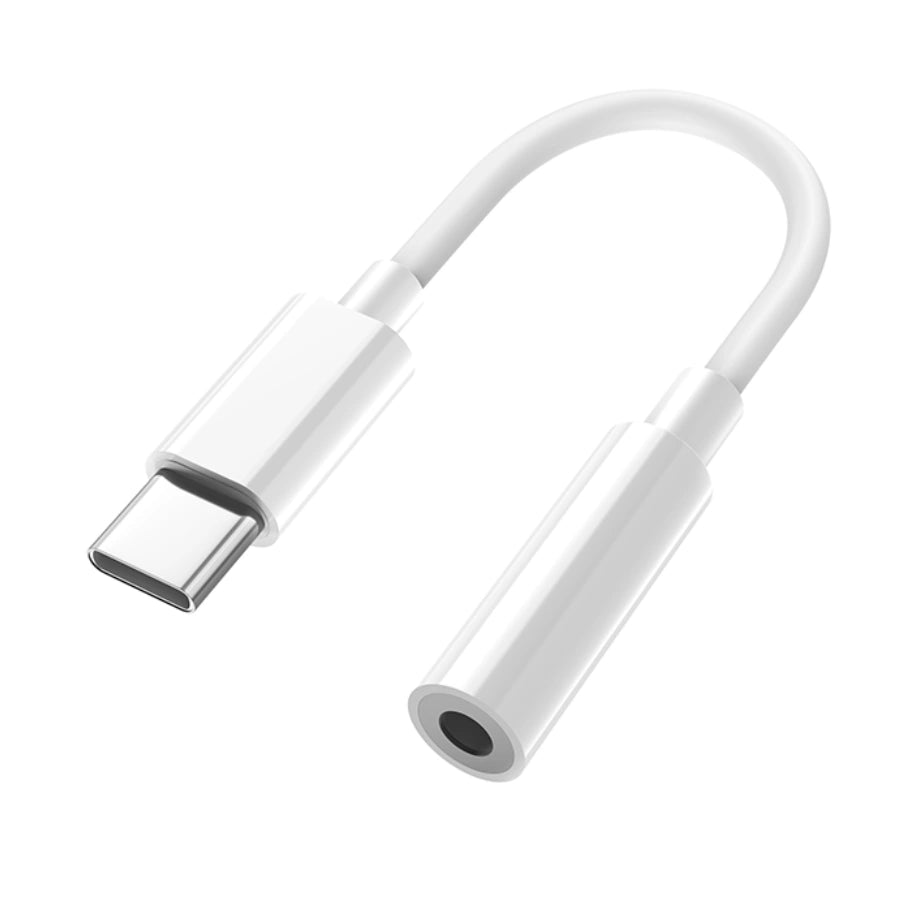 White USB-C to 3.5mm audio adapter with short cable on a light background
